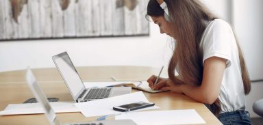 Students create a new project. Girl learning and use the laptop